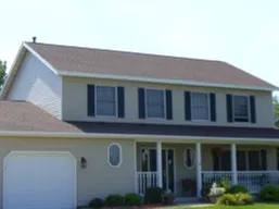 Slide of Joe Tlougan Roofing