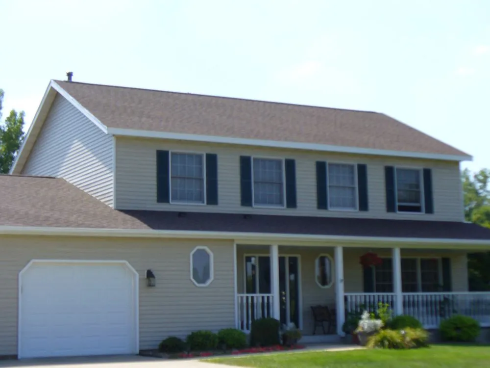Slide of Joe Tlougan Roofing