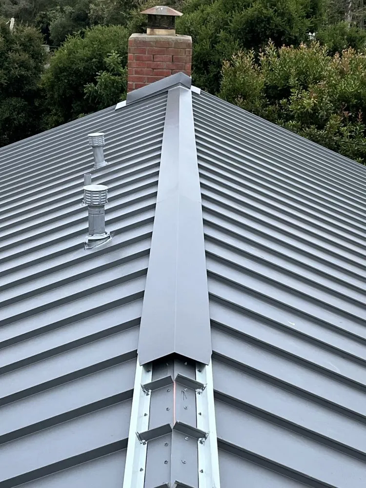 Slide of Joel's Roofing & Rain Gutter