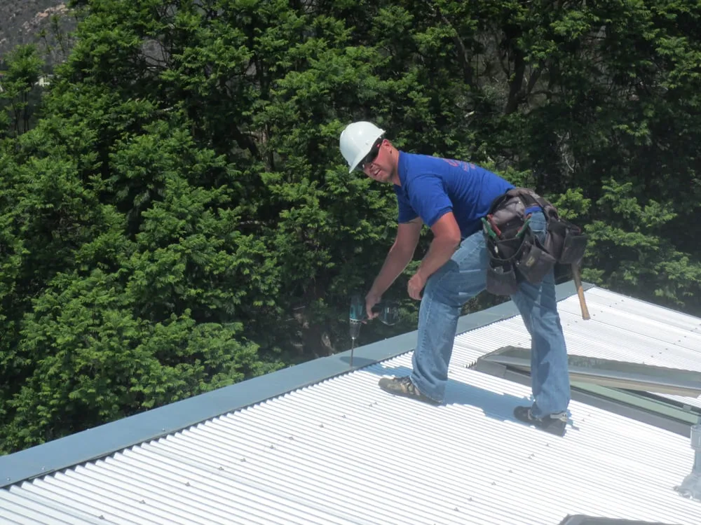 Slide of Joel's Roofing & Rain Gutter