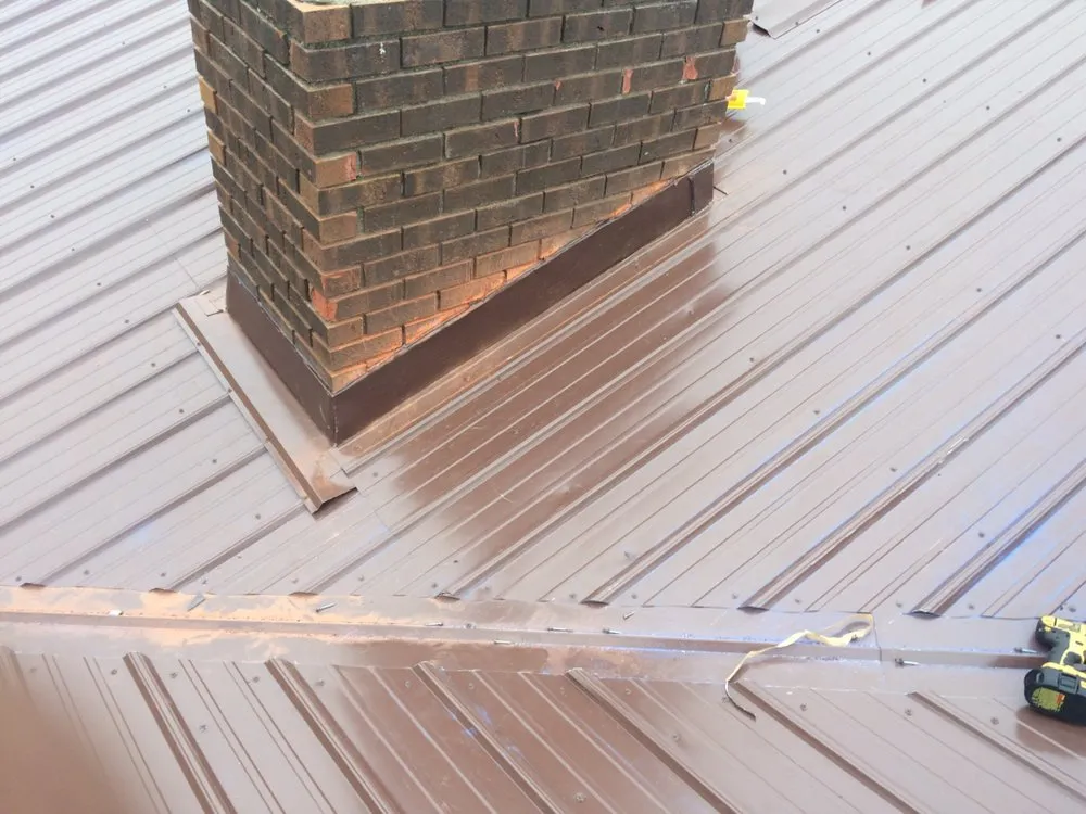 Licensed flat roof repair for residential properties in Rockaway Beach, MO by Joe's Roofing and Construction
