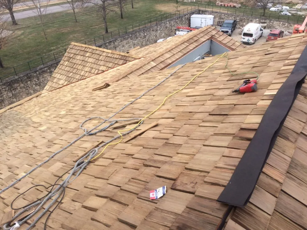 Professional roof inspection after storm damage in Rockaway Beach, MO by Joe's Roofing and Construction