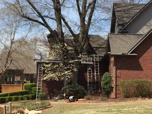 Joe's Roofing and Construction Logo
