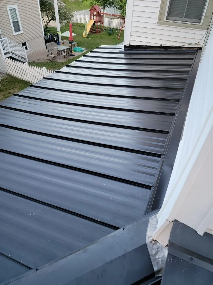 Slide of Joe's Roofing Lowell