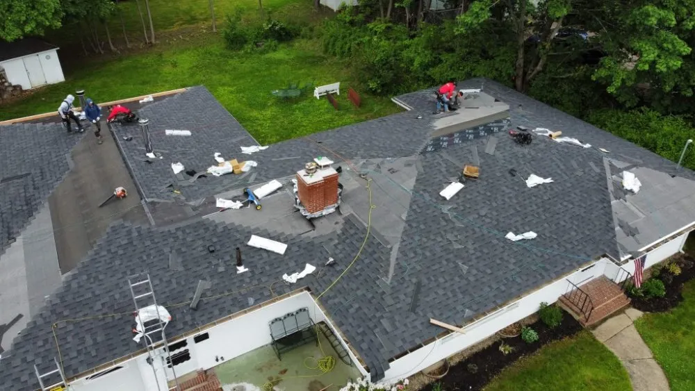 Slide of Joe's Roofing Lowell