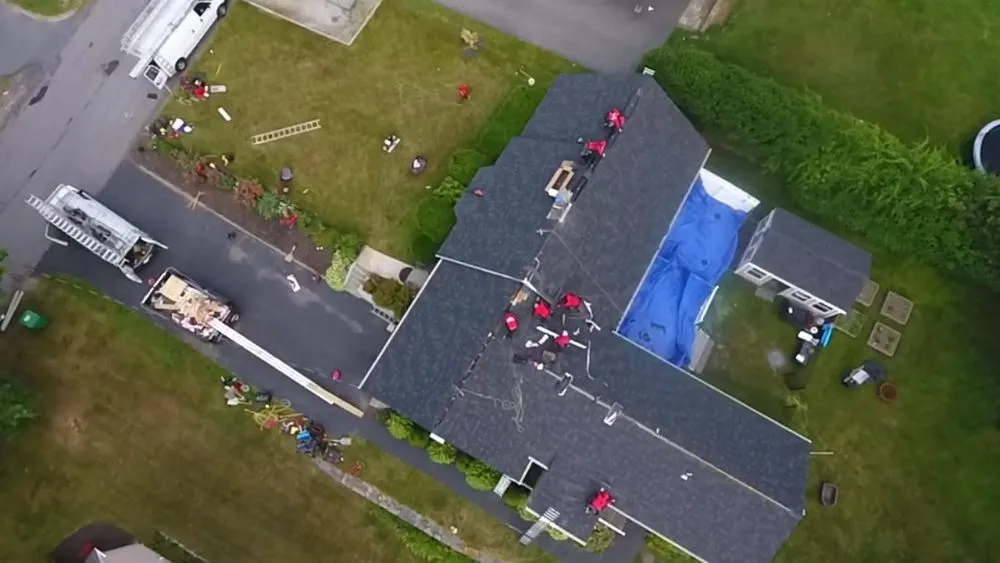 Slide of Joe's Roofing Lowell