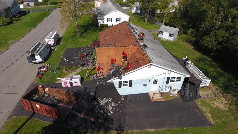 Slide of Joe's Roofing Lowell