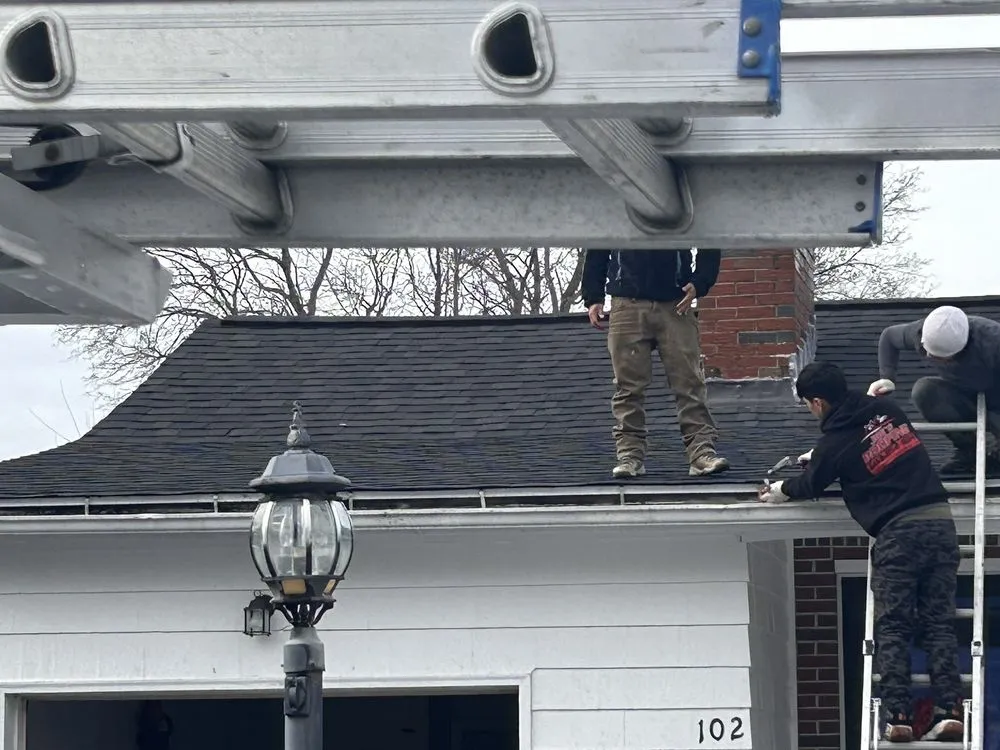 Slide of Joe's Roofing Lowell