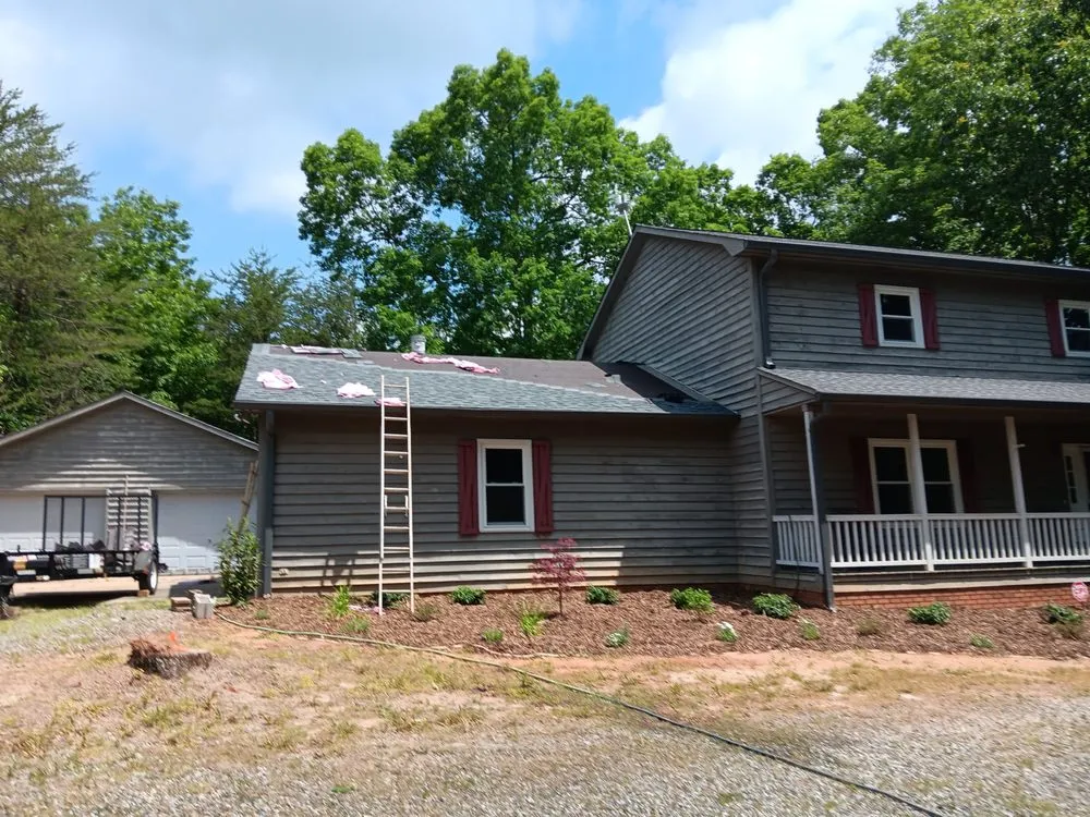 Slide of John & Sons Roofing