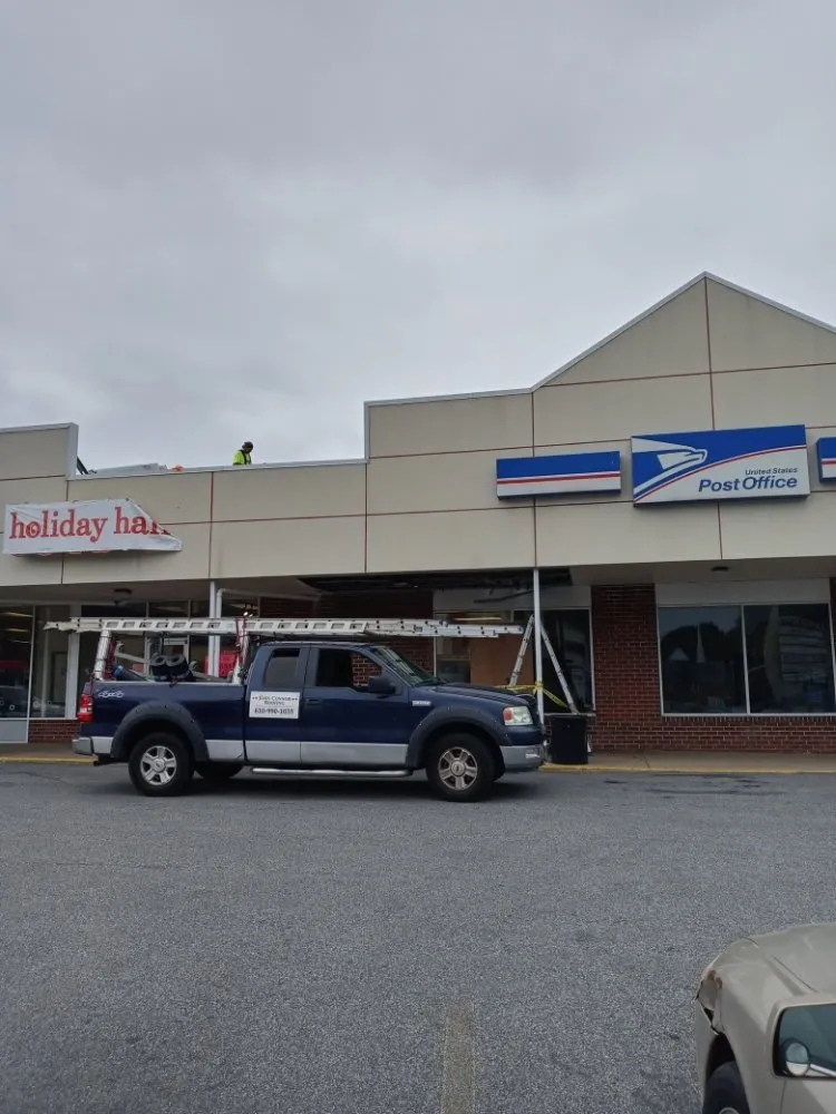 Slide of John Connor Roofing