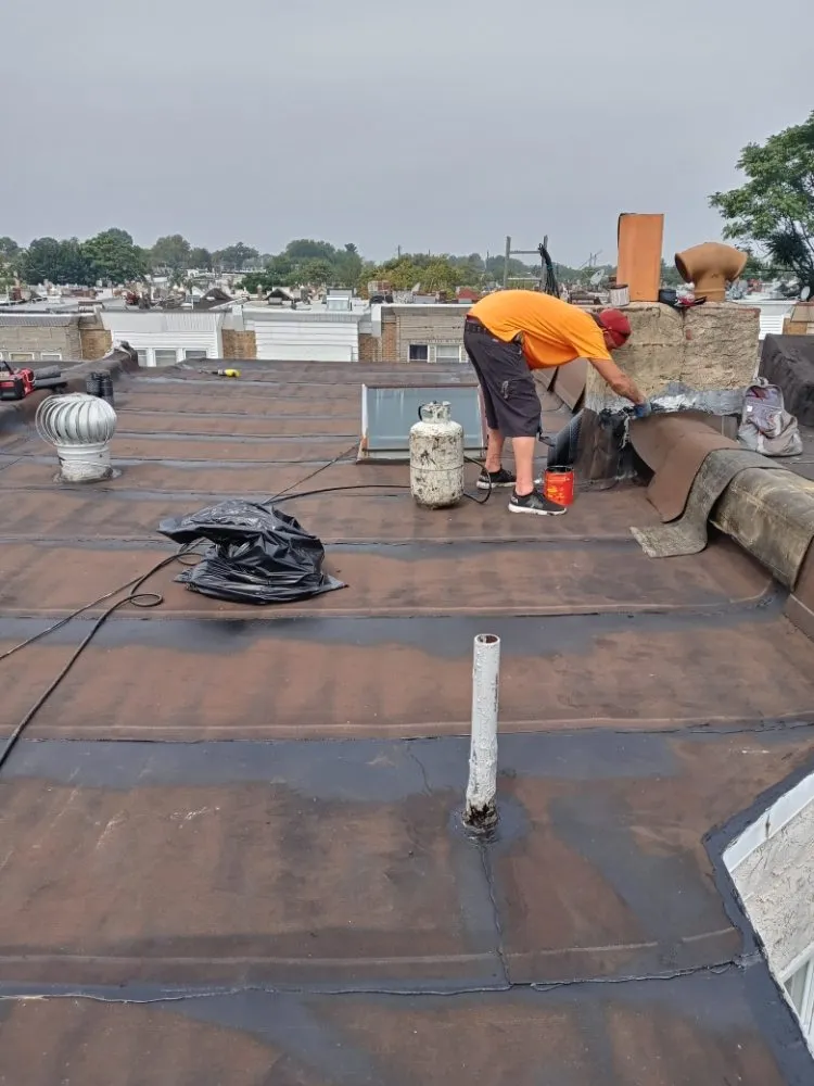 Slide of John Connor Roofing