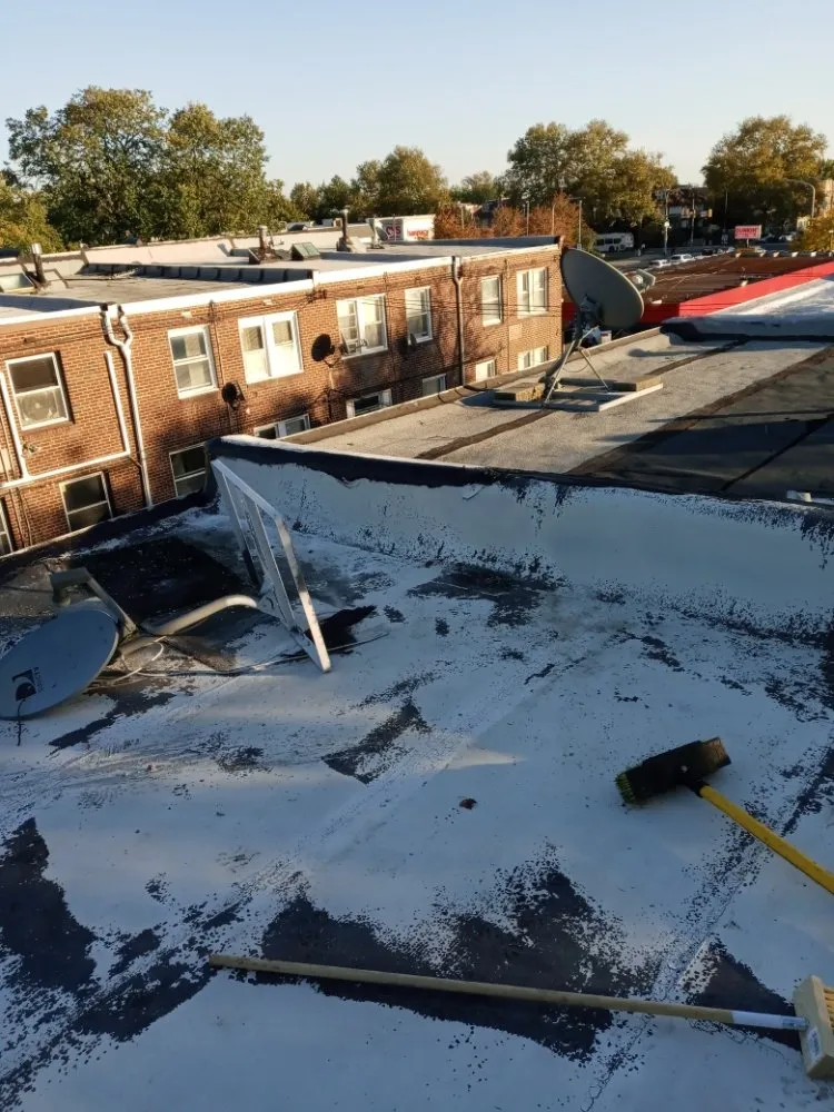 Slide of John Connor Roofing