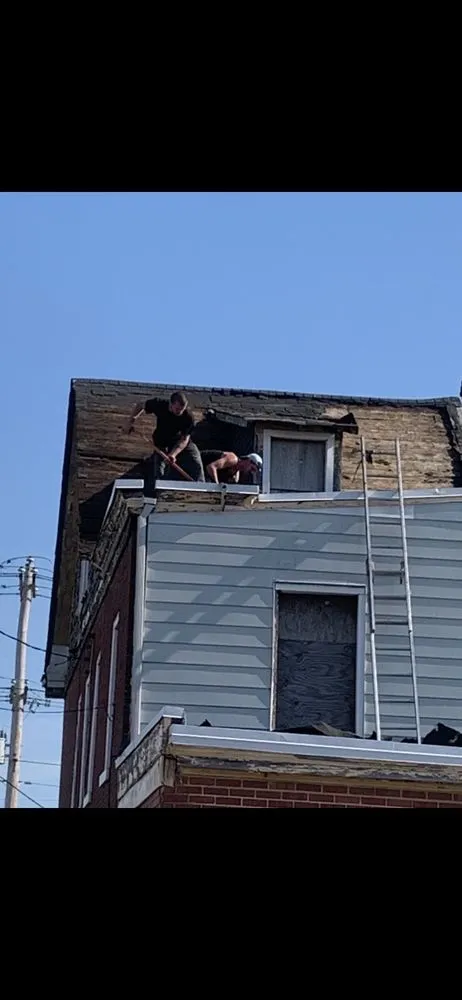 Slide of John Connor Roofing