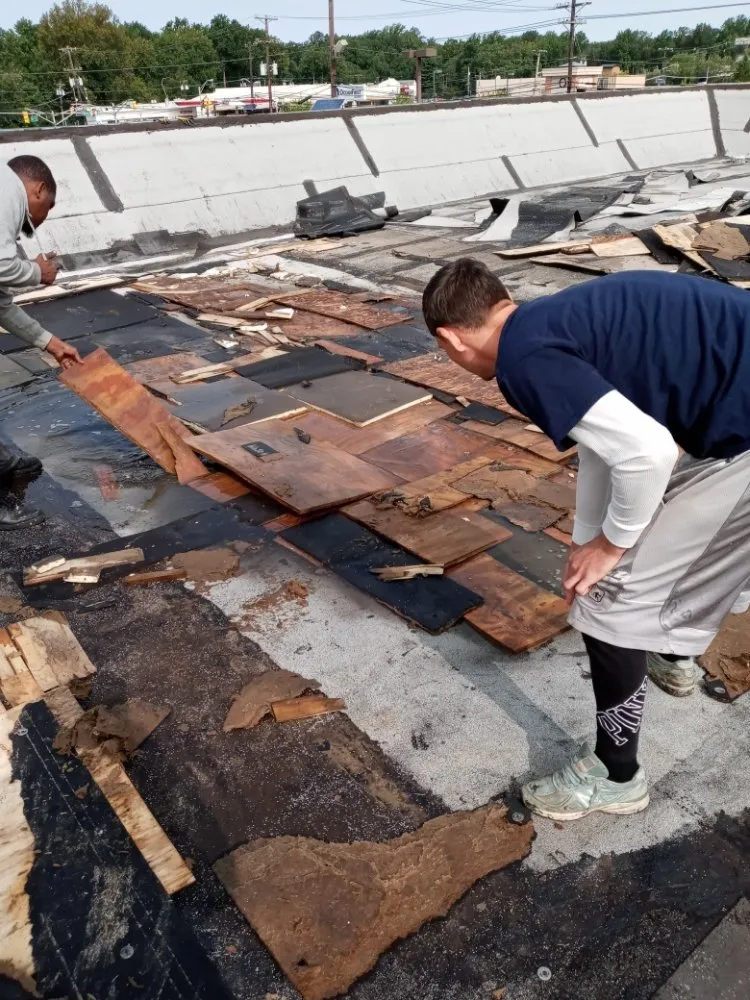 Slide of John Connor Roofing