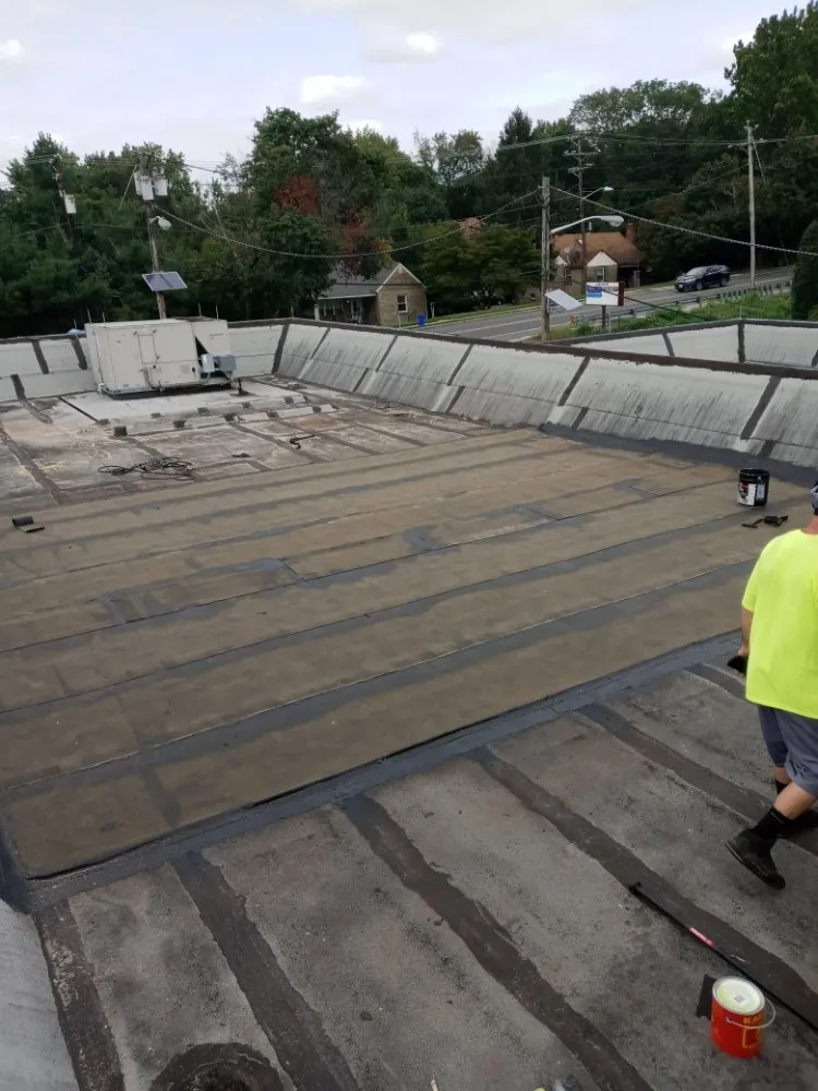 Slide of John Connor Roofing