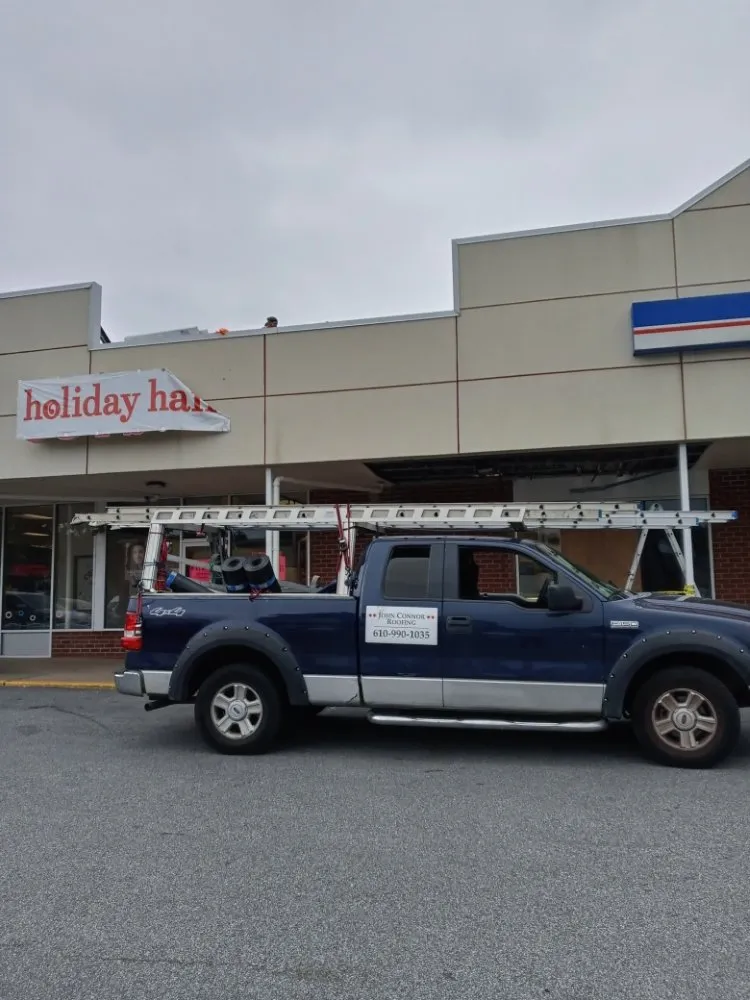 Slide of John Connor Roofing