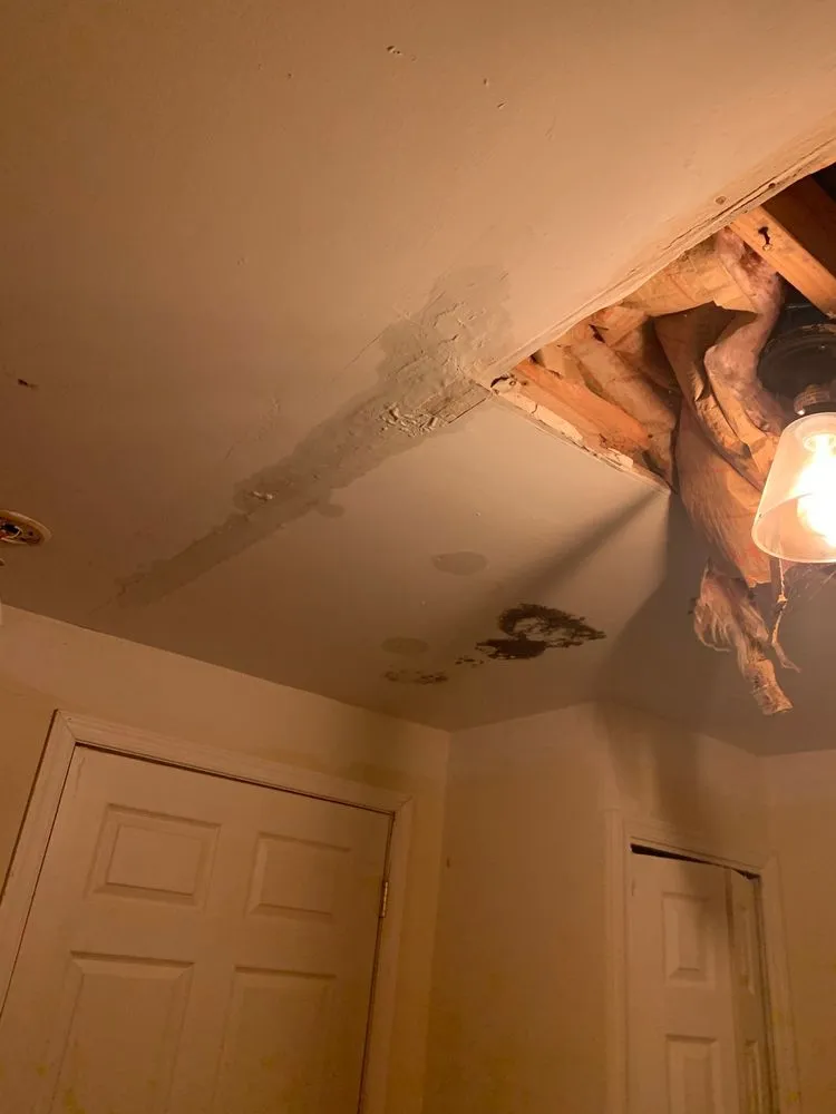 Slide of John Connor Roofing