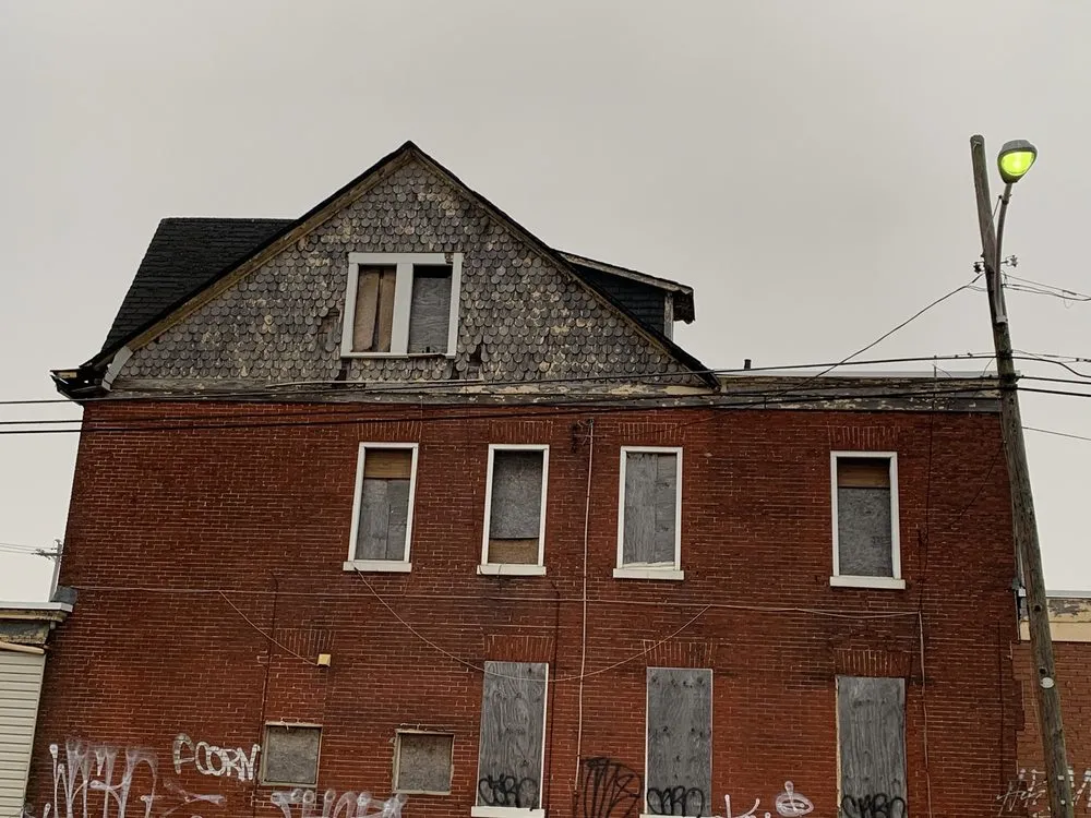 Slide of John Connor Roofing