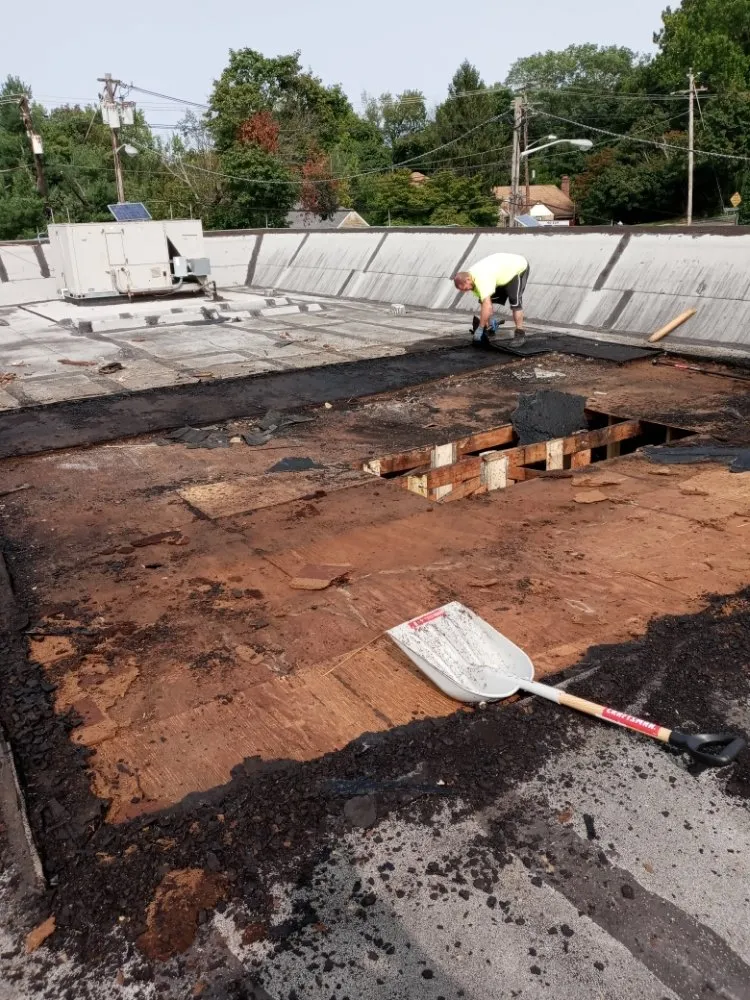 Slide of John Connor Roofing