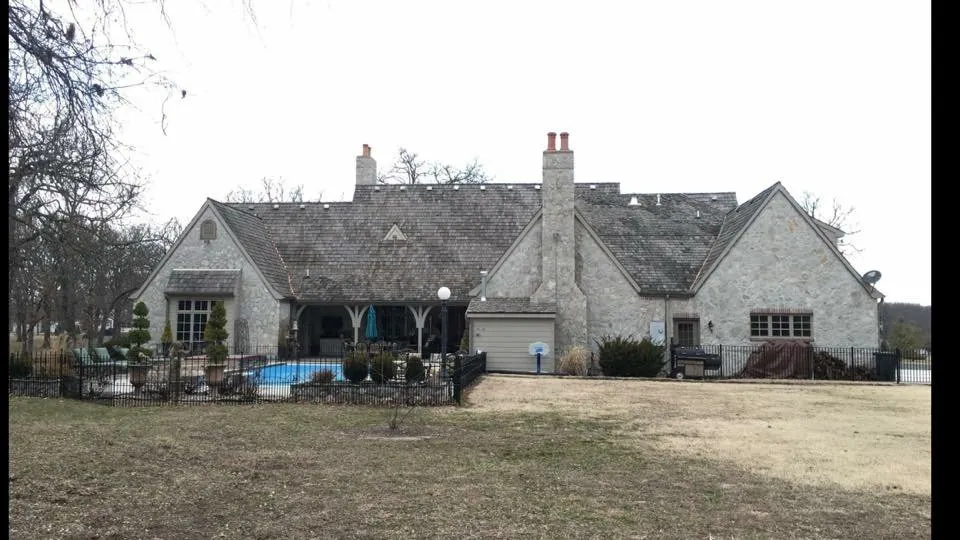 Slide of John Cotten Roofing