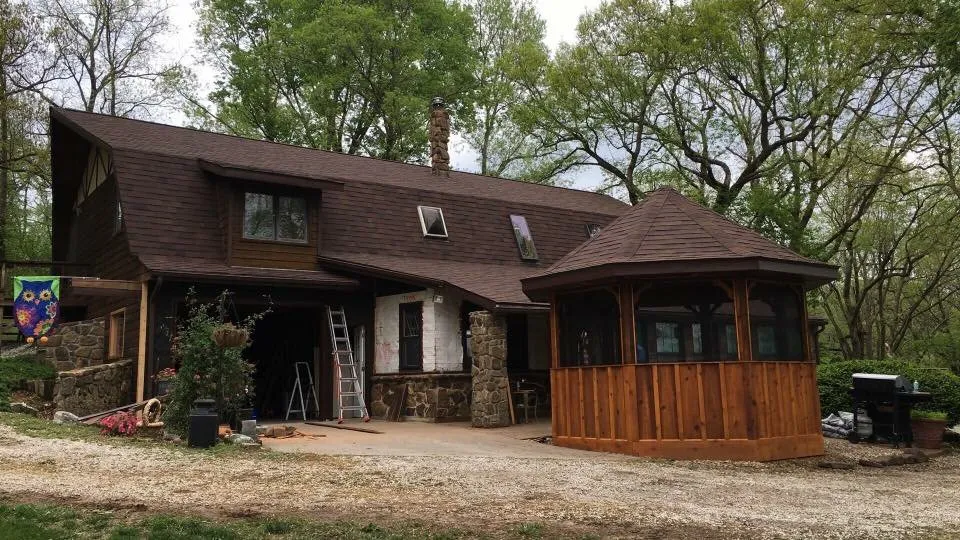 Slide of John Cotten Roofing