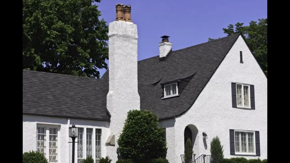 Slide of John Cotten Roofing