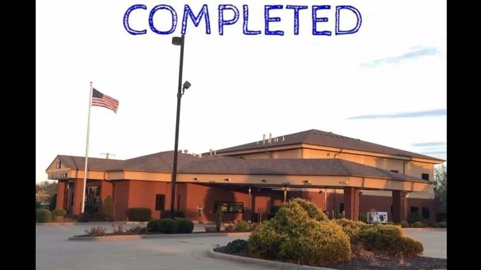 Slide of John Cotten Roofing