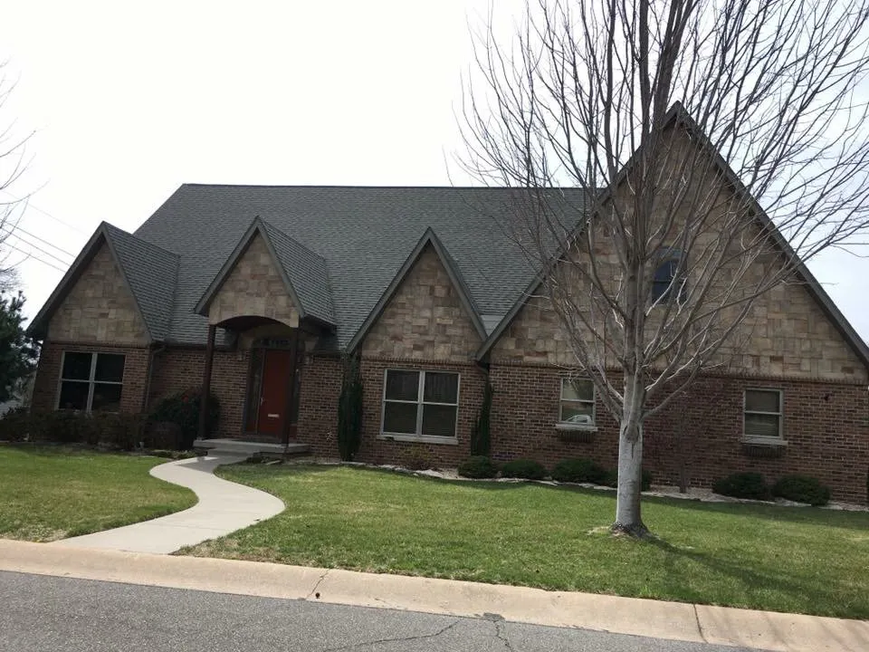 Slide of John Cotten Roofing