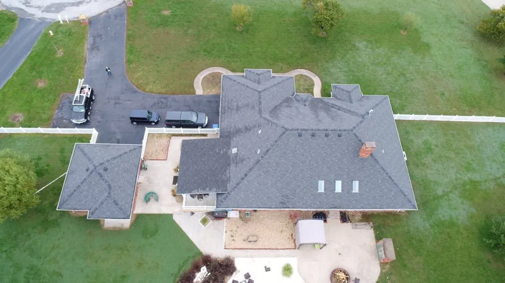 Slide of John Cotten Roofing