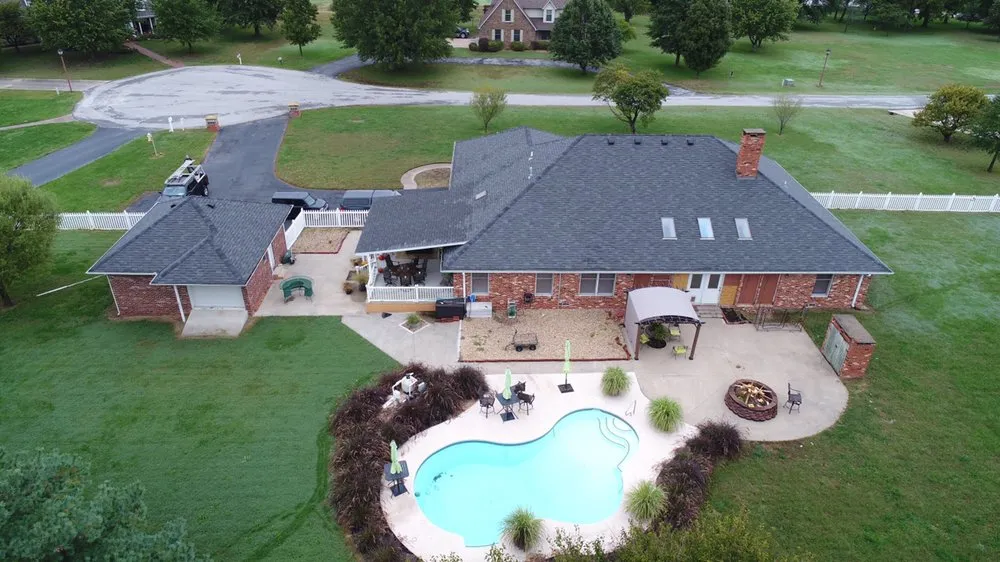 Slide of John Cotten Roofing