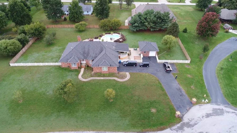 Slide of John Cotten Roofing