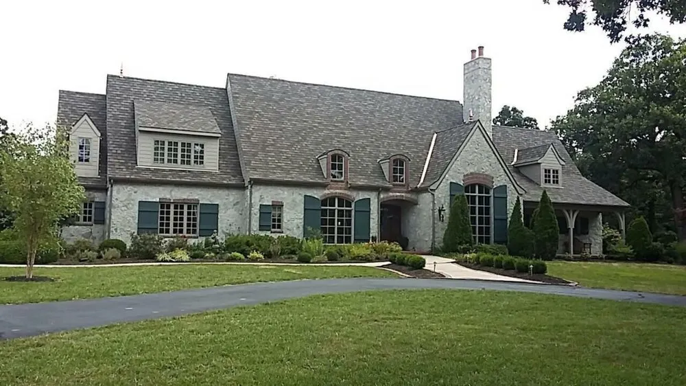 Slide of John Cotten Roofing