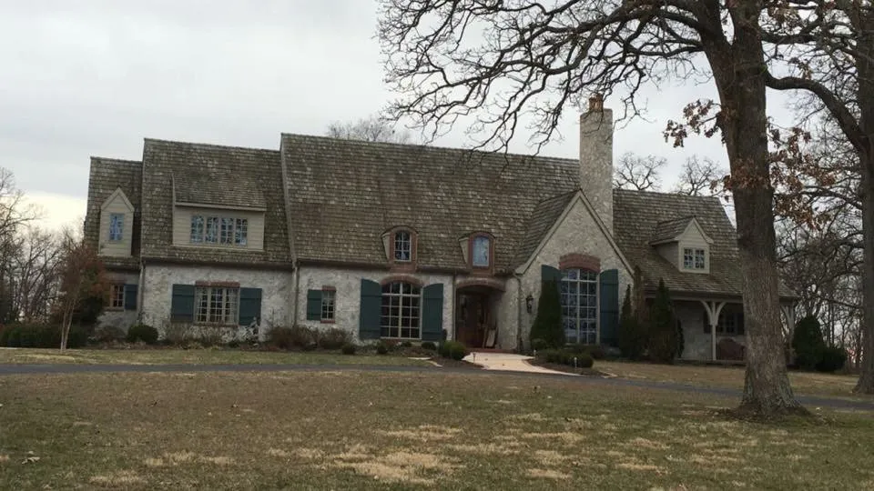 Slide of John Cotten Roofing