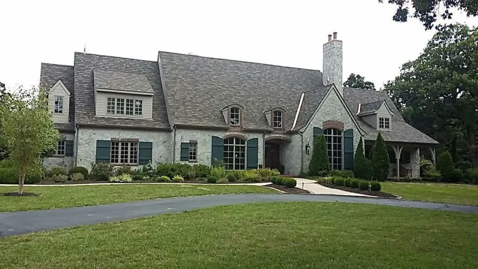 Slide of John Cotten Roofing
