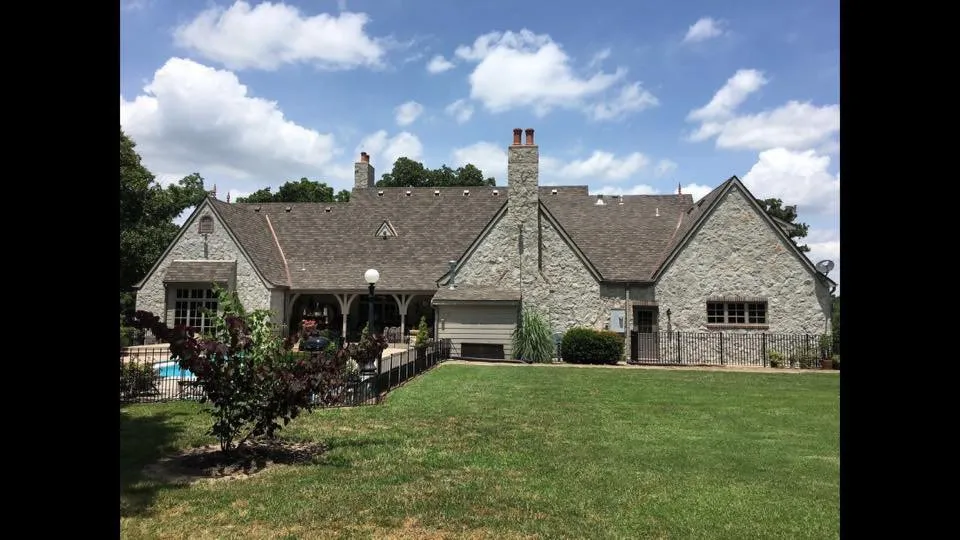 Slide of John Cotten Roofing