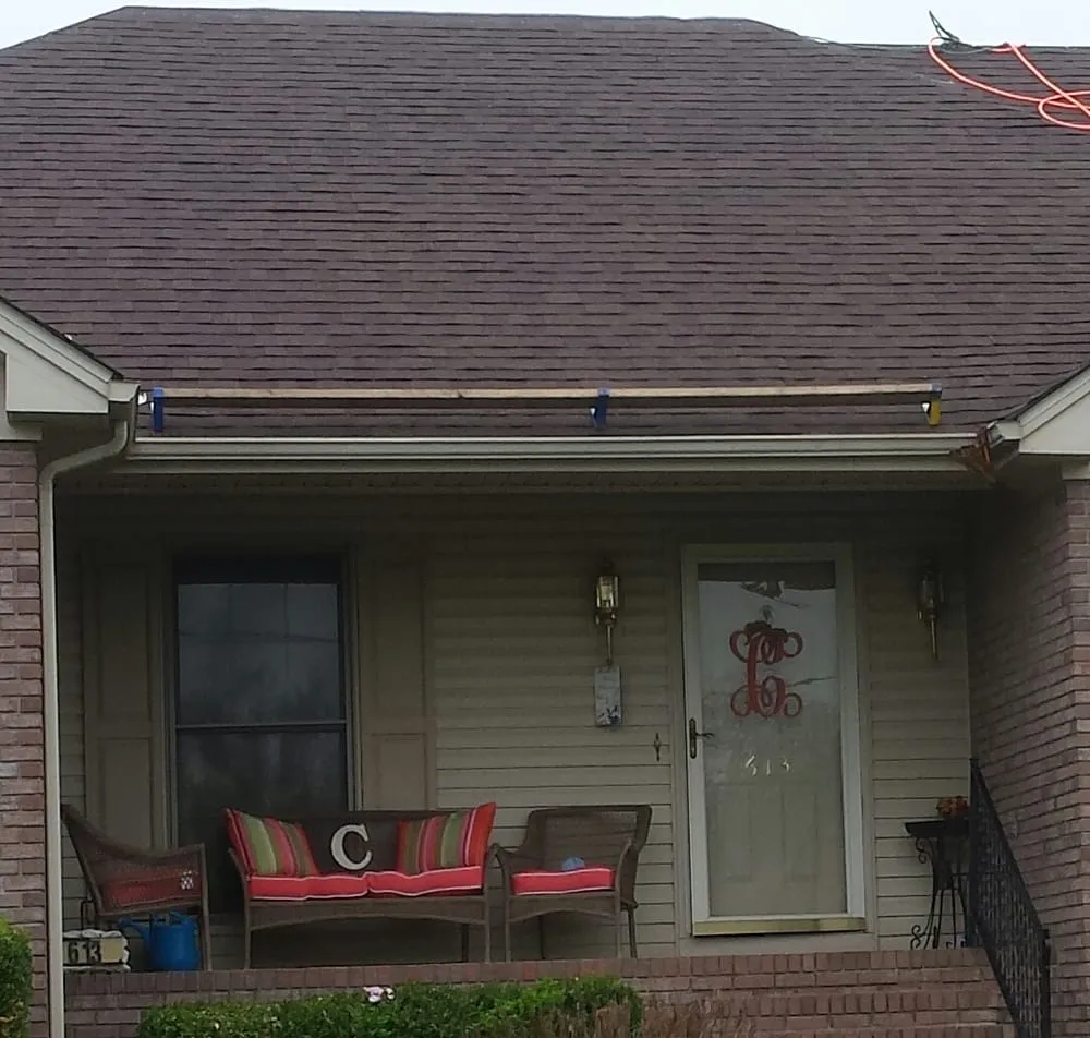 Slide of John Curtiss Roofing