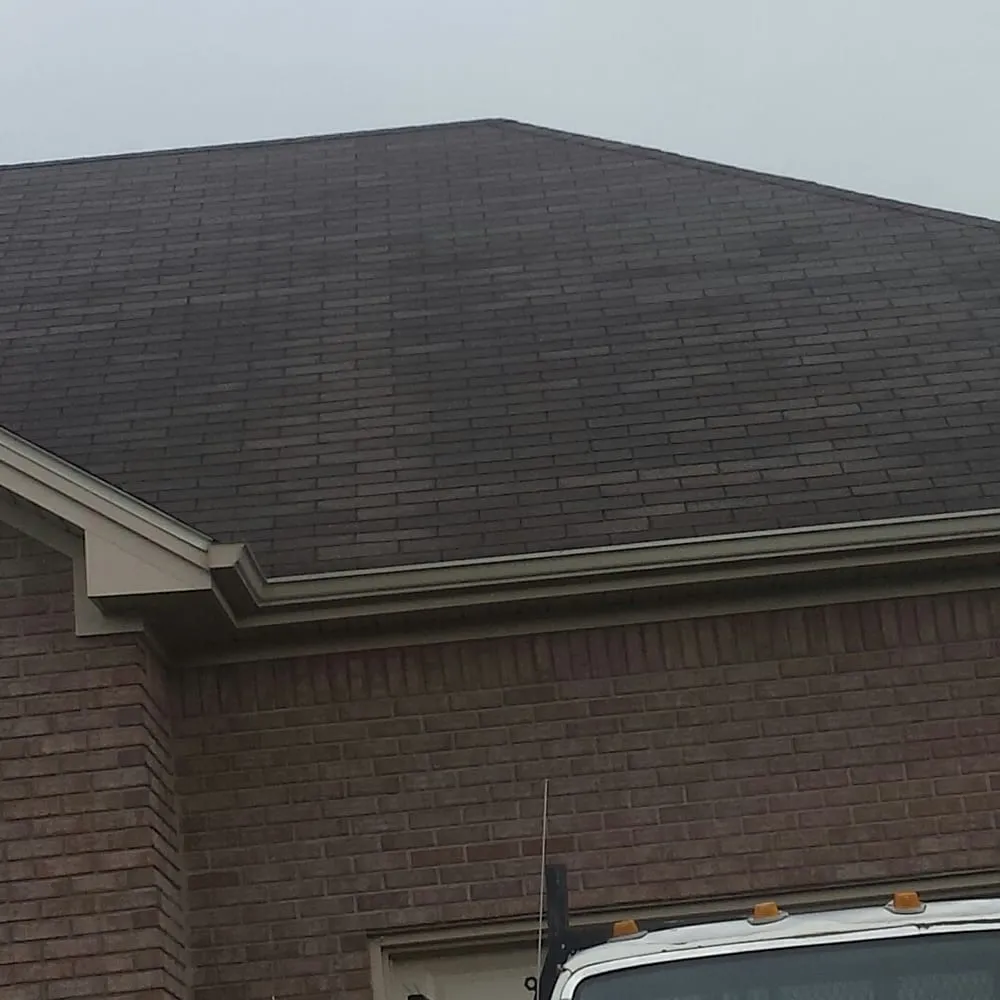 Slide of John Curtiss Roofing