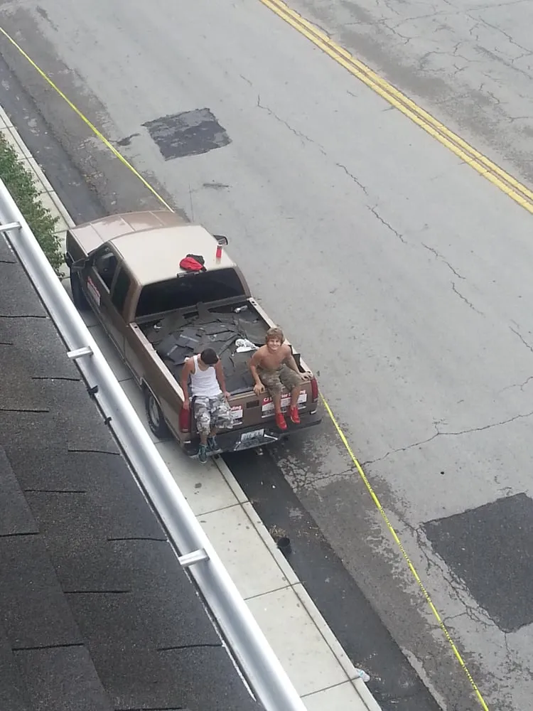 Slide of John Curtiss Roofing