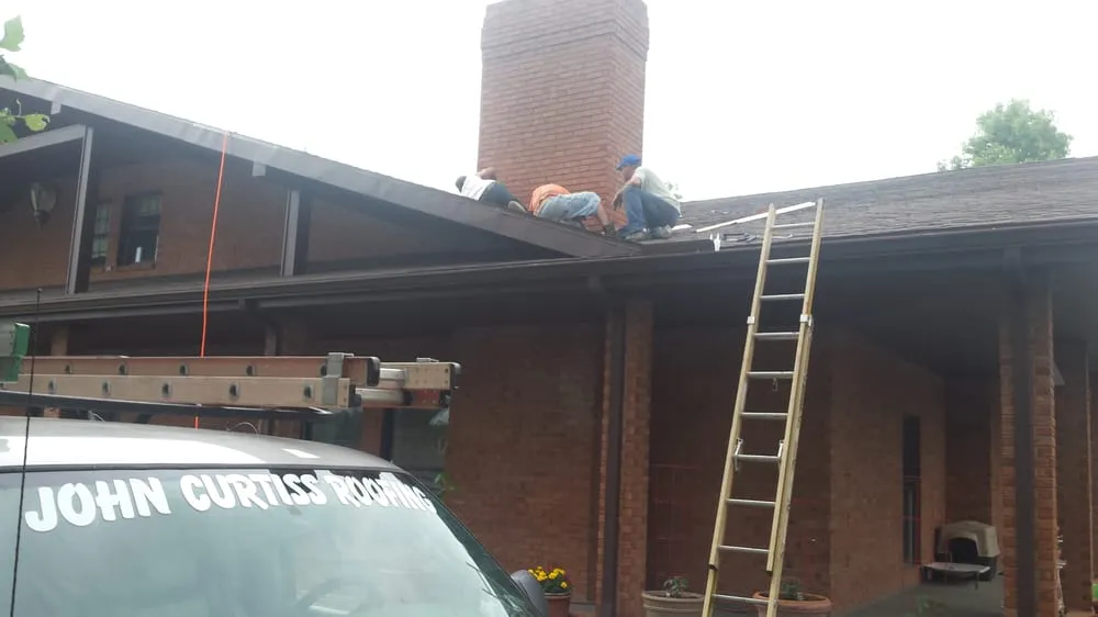 Slide of John Curtiss Roofing