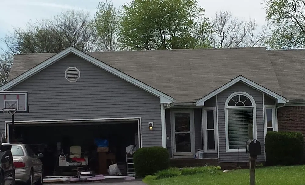 Slide of John Curtiss Roofing