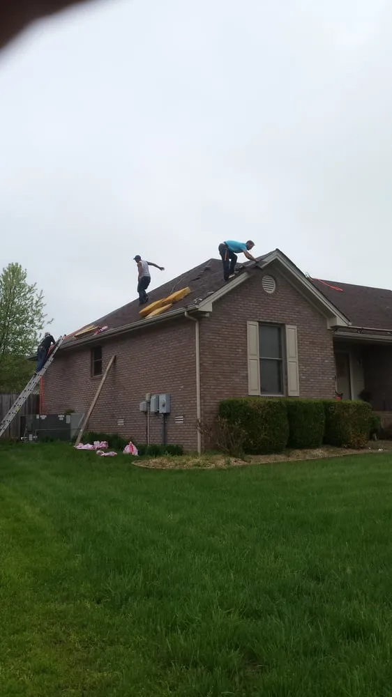 Slide of John Curtiss Roofing