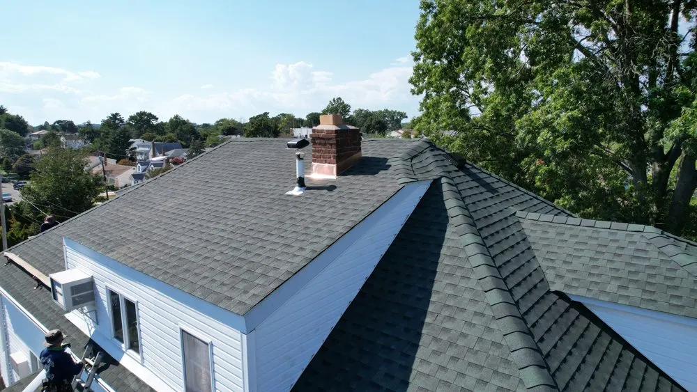 Slide of John Goess Roofing