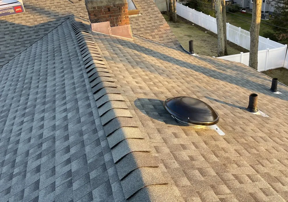 Slide of John Goess Roofing