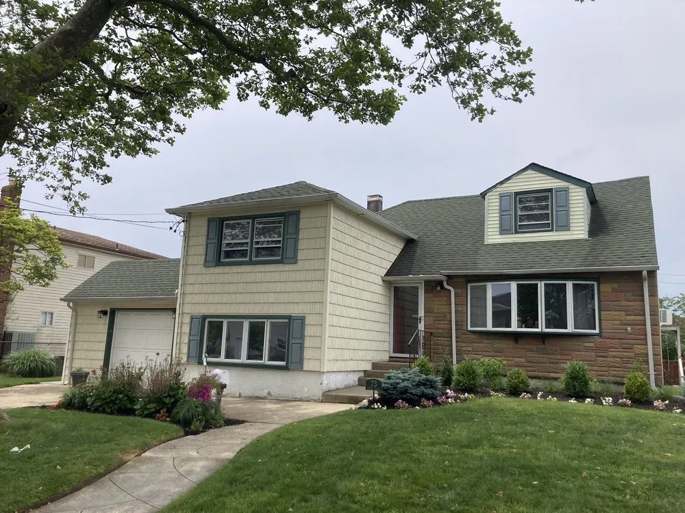 Slide of John Goess Roofing