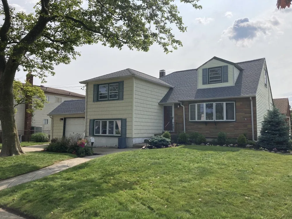 Slide of John Goess Roofing