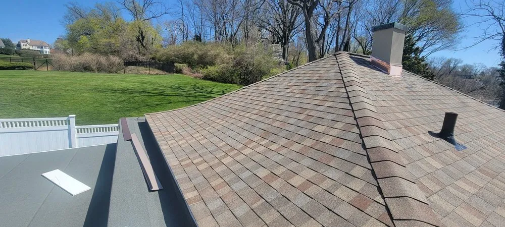 Slide of John Goess Roofing