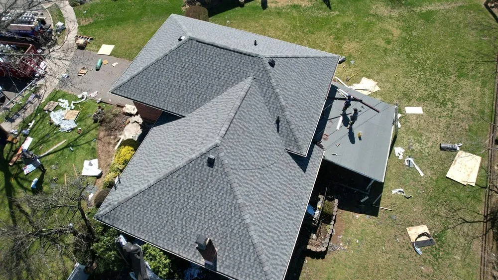 Slide of John Goess Roofing