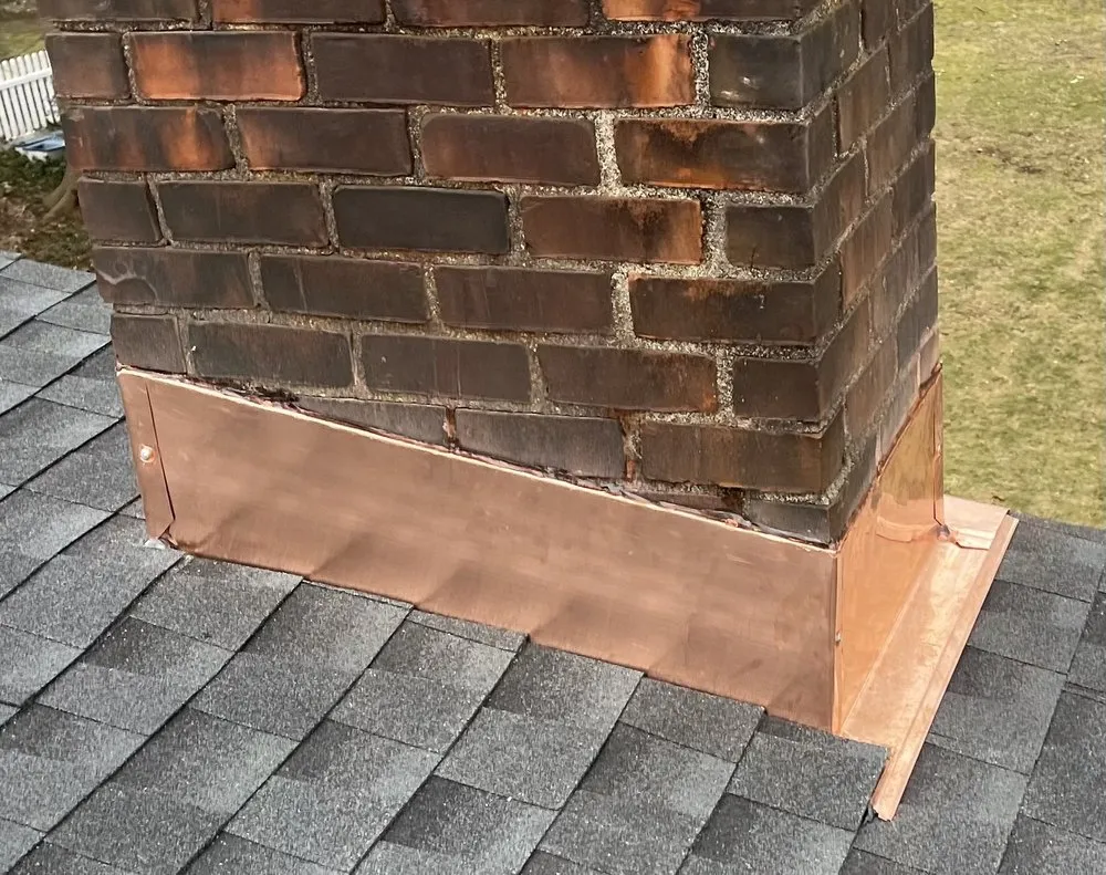 Slide of John Goess Roofing