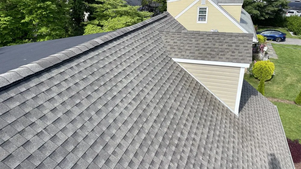 Slide of John Goess Roofing