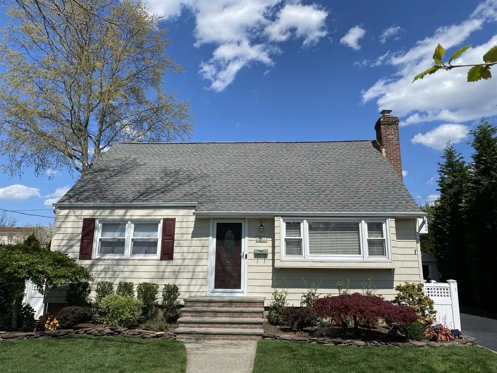 Slide of John Goess Roofing